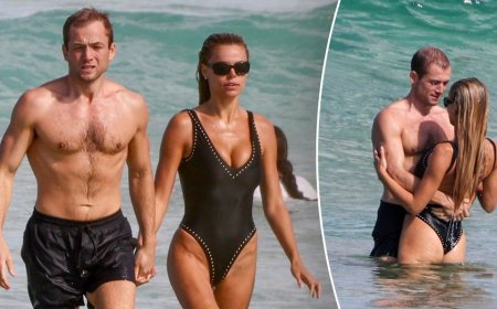 Brooks Nader flaunts plunging swimsuit during steamy beach date with actor Taron Egerton in Australia